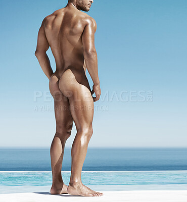 Buy stock photo Beach, sensual and naked muscular man standing outdoor for a sun tan while on a holiday in Hawaii. Sexy, erotic and body of an attractive male model sunbathing by the ocean while on a summer vacation