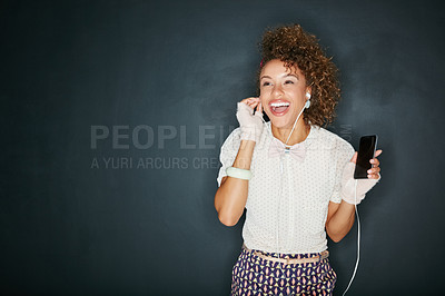 Buy stock photo Phone music, singer and black woman listening to song, audio podcast or radio sound for fun energy. Studio singing mockup, screaming girl or excited student isolated on mock up dark background