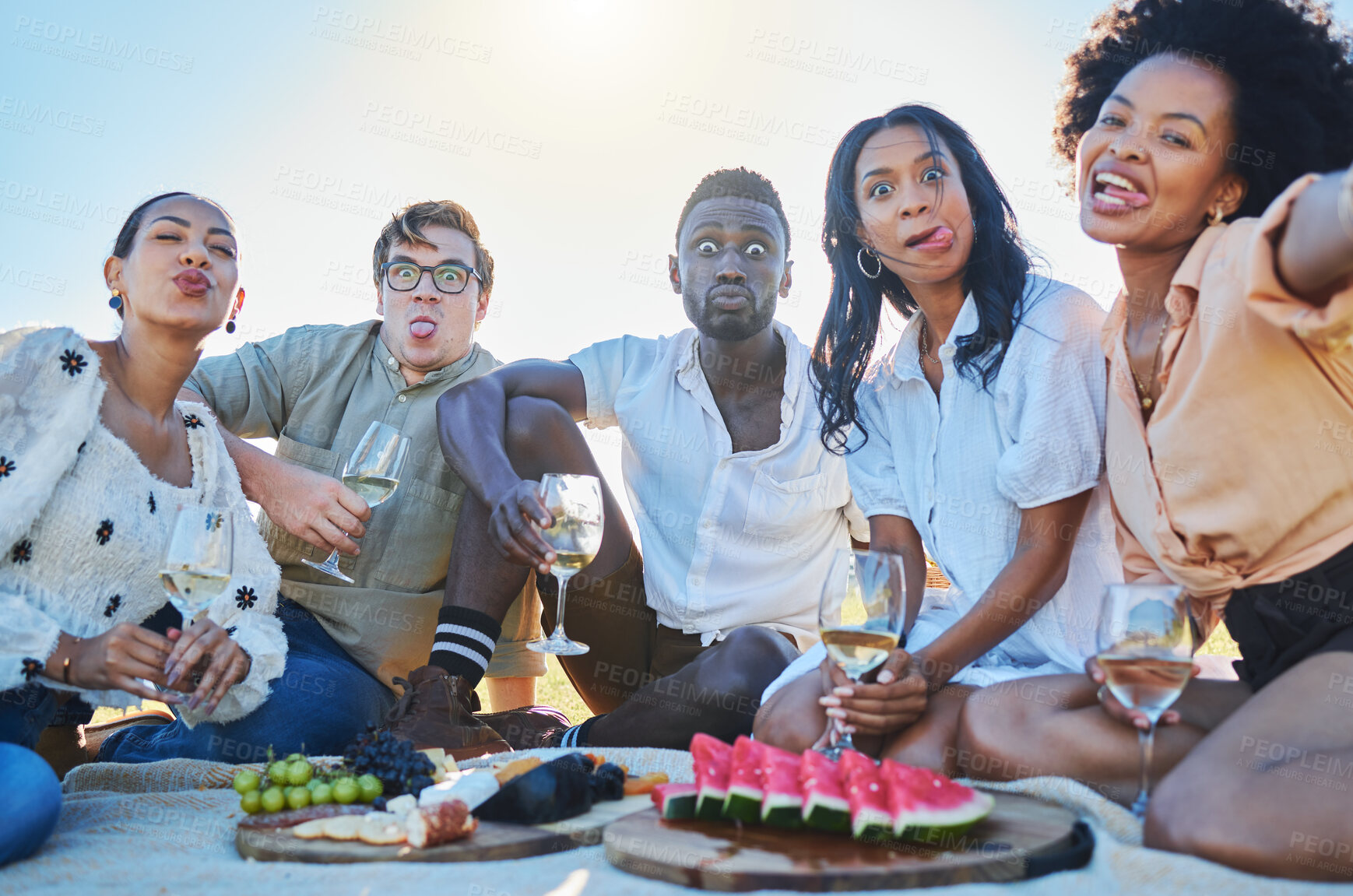 Buy stock photo Watermelon, selfie or crazy friends on picnic to enjoy bonding or eating healthy fruits in summer. Grapes, funny faces or happy people drinking wine with food on a relaxing holiday vacation in nature