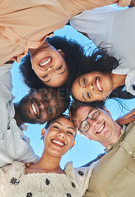 Trust, happy and friends portrait huddle for bonding, hug and summer fun together with smile. Adventure, freedom and happiness of excited young people in interracial friendship with low angle.