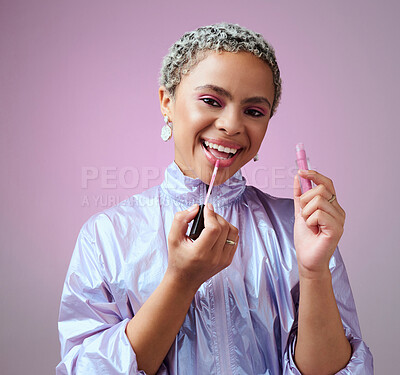 Buy stock photo Fashion, beauty and purple with black woman and makeup for cosmetics, designer and luxury in pink background studio. Model, creative and lipstick with girl and color for neon, hair and youth