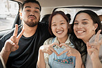 Friends, road trip and hand gesture with a man and woman group making peace and heart shape sign in a car. Diversity, travel and transportation with a male and female friend bonding in a vehicle