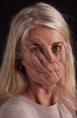 Buy stock photo Mental health, hand and portrait with a senior woman in studio on a dark background suffering from depression. Fear, anxiety and face with a mature female struggling with her identity on overlay