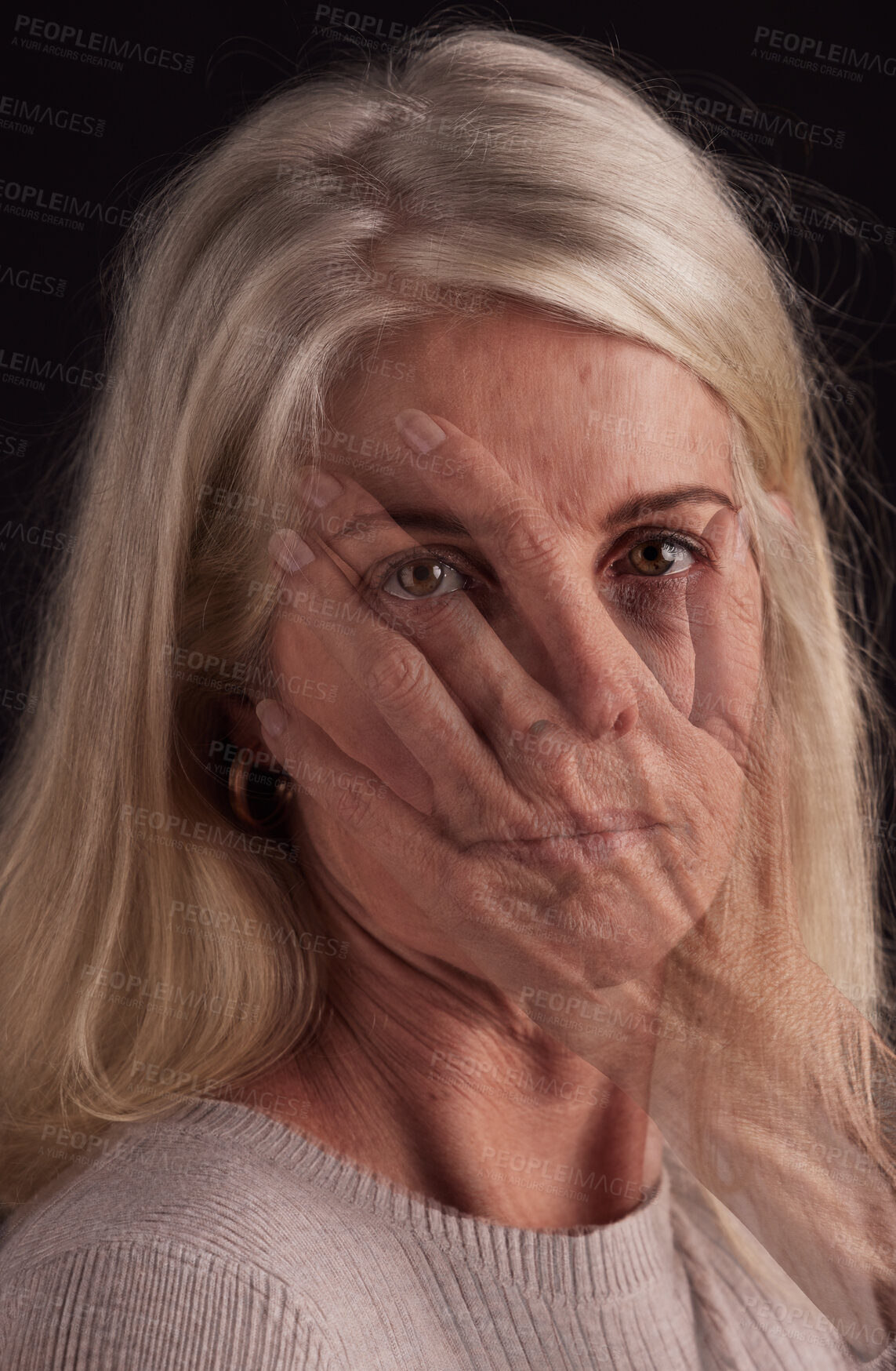 Buy stock photo Mental health, hand and portrait with a senior woman in studio on a dark background suffering from depression. Fear, anxiety and face with a mature female struggling with her identity on overlay