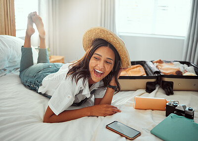 Buy stock photo Happy, travel packing and woman on a hotel bed with suitcase ready for summer vacation. Luggage, bedroom and smile of a person relax in accommodation with clothes or happiness about traveling journey