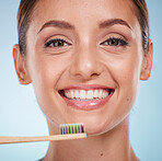 Brushing teeth, dental and woman with toothbrush for teeth whitening and beauty, oral health and fresh breath with studio background. Mouth wellness, Invisalign portrait and clean with bamboo brush.