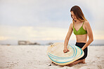 Beach, adventure and surfer with woman and surfboard, beach sand and surfing in Australia. Sport, fitness and travel with surf and sea, mockup with young girl outdoor and wellness on holiday.