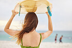 Beach, fitness or woman with surfboard, freedom or calm peace watching the relaxing ocean waves on holiday vacation. Travel, back view or healthy girl athlete thinking of surfing goals or training
