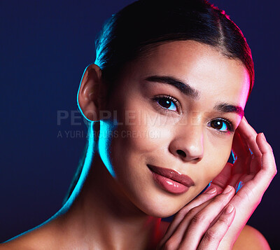Buy stock photo Beauty, neon shadow light and portrait of woman with dark lighting, facial cosmetics and skincare glow. Luxury studio makeup, aesthetic creativity and face model with creative pink blue color design