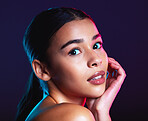 Beauty, neon shadow light and portrait of woman with dark lighting, facial cosmetics and skincare glow. Luxury studio makeup, aesthetic creativity and face model with creative pink blue color design