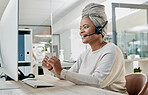 Crm, contact us or black woman in call center at customer services for a communication or telemarketing agency. Computer, microphone or African consultant talking, helping or speaking at office desk