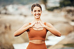 Fitness portrait, hands heart and woman in nature for health or wellness. Sports, training and face of female athlete with emoji for love, affection and romance outdoors getting ready for practice.
