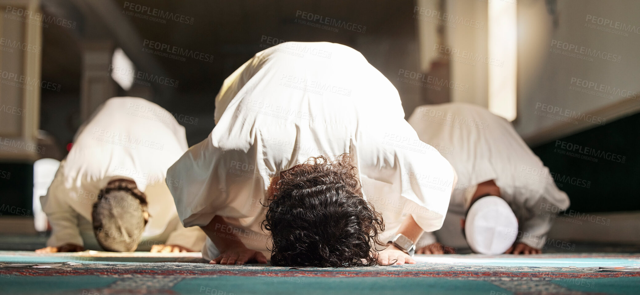 Buy stock photo Muslim, prayer and mosque with a spiritual man group praying in faith during fajr, dhuhr or asr, otherwise maghrib or isha'a. Salah, worship and pray with islam men at ramadan for holy tradition