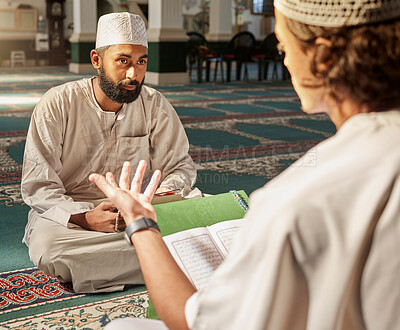 Quran, muslim and mosque with an imam teaching a student about religion, tradition or culture during eid. Islam, book or worship with a religious teacher and islamic male praying together for ramadan