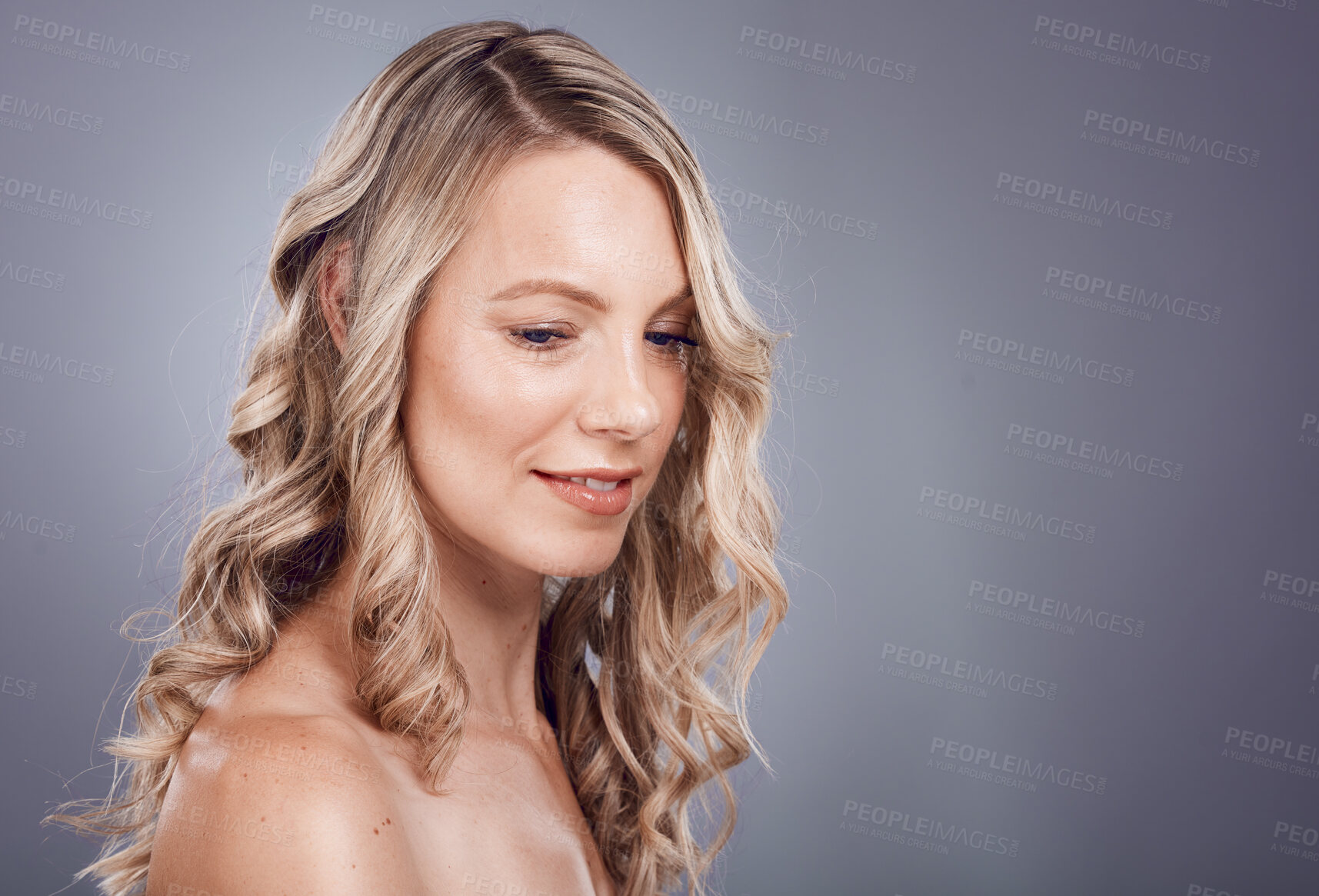 Buy stock photo Beauty, skincare and hair care, woman in studio with luxury makeup and care for healthy and clean hairstyle. Health, wellness and beautiful model girl with blonde salon hair style on grey background.