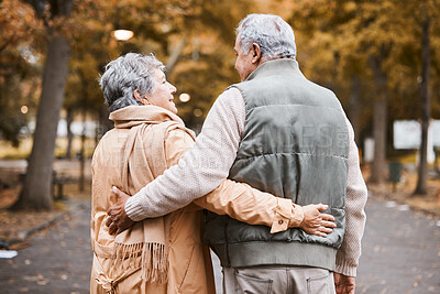 Buy stock photo Senior couple, love and health while walking outdoor for exercise, happiness and care at a park in nature for wellness. Old man and woman embrace in a healthy marriage during retirement with freedom