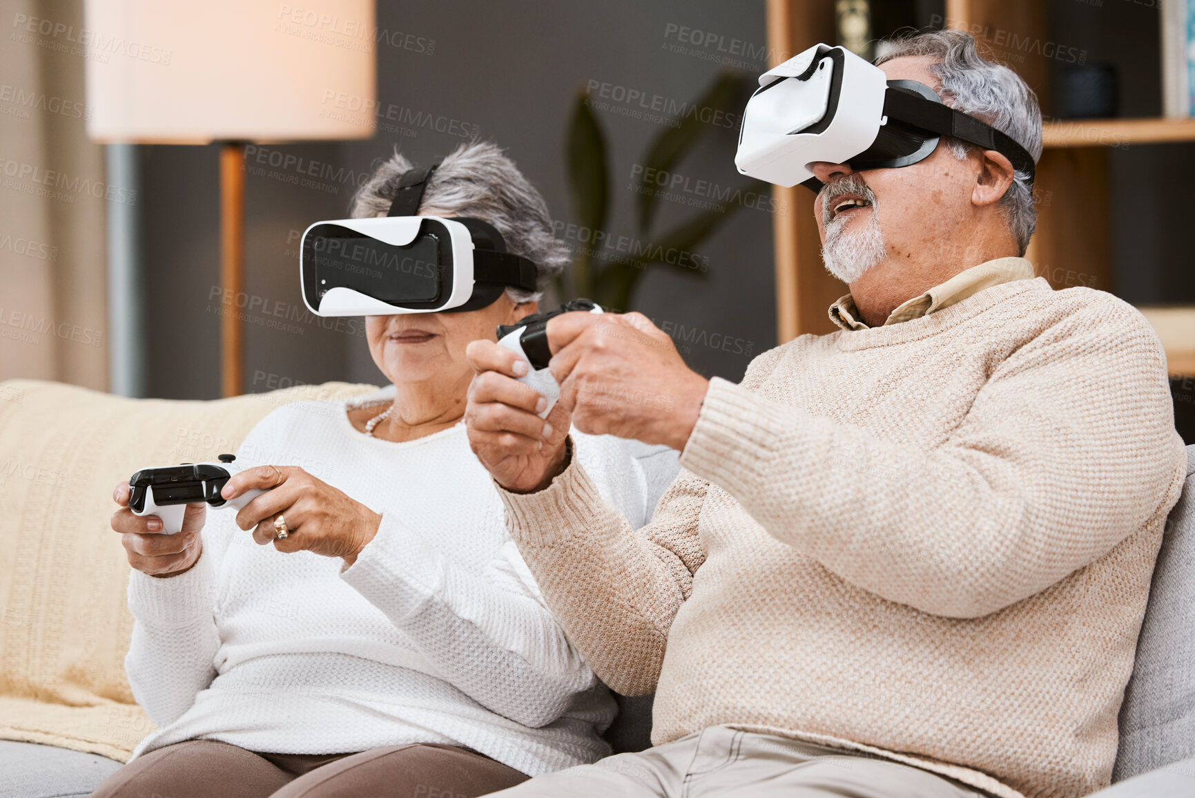 Buy stock photo Virtual reality, gaming and senior couple on sofa in living room having fun. Vr gamer, metaverse and retired elderly man and woman playing futuristic, 3d and ai games with controller while relaxing.