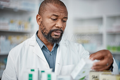 Buy stock photo Pharmacy, pharmacist and black man check inventory on shelf in shop. Wellness, healthcare products and male medical professional checking stock for medicine, medication boxes or pills in drug store.