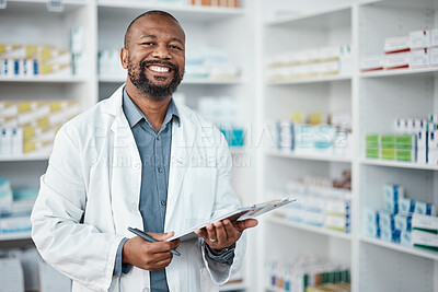 Buy stock photo Pharmacy, portrait and black man with clipboard, medicine and pill prescription. African American male, pharmacist and medical professional writing, make notes for stock and inventory for healthcare.