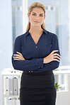 Business woman, focus portrait and crossed arms in modern office for corporate goals motivation, employee positive mindset energy and confidence. Leader success, ceo vision and serious in workplace