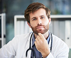 Portrait, thinking and healthcare with a doctor man sitting in his office of a hospital for consulting or treatment. Face, idea and medical with a male medicine professional in a clinic for care