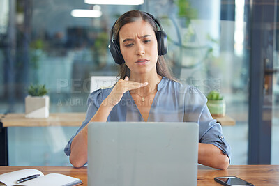 Buy stock photo Business woman, laptop and headphones for a webinar, video conference or video call on zoom in a office. Entrepreneur serious while talking at computer screen for training, learning or online meeting