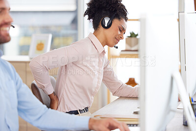 Buy stock photo Back pain, stress or black woman in call center with a spine injury, burnout or muscle problem at office desk. Callcenter, emergency or sales agent frustrated with uncomfortable bad chair or backache