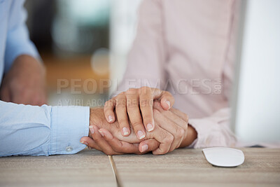 Buy stock photo Support, trust and couple holding hands in office for unity, union or comfort. Empathy, love or care of business people, man and woman together for teamwork, collaboration and solidarity in workplace