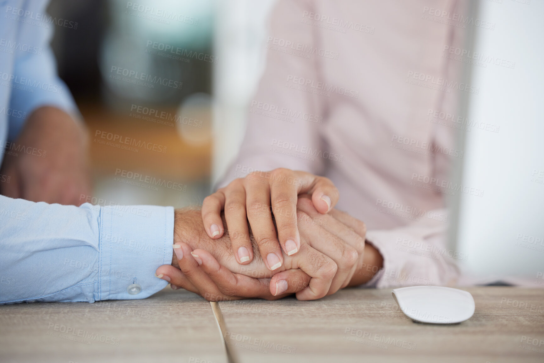 Buy stock photo Support, trust and couple holding hands in office for unity, union or comfort. Empathy, love or care of business people, man and woman together for teamwork, collaboration and solidarity in workplace