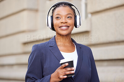 Buy stock photo Business woman, headphones and music with coffee outdoor, travel to work or coffee break with podcast or radio. Black woman on commute, listening with technology and audio streaming in the city.