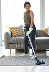 Portrait, woman and vacuum for cleaning, living room and chores for freshness, dirt and hygiene. Female, girl and cleaner with machine to remove dust, housework and wellness in lounge, carpet or home