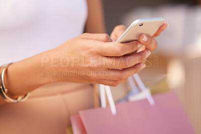 Buy stock photo Hands with smartphone, woman and shopping bag at mall for retail therapy with technology and communication. Mobile app, phone zoom and shopping, fashion and designer clothes at outdoor shopping mall.