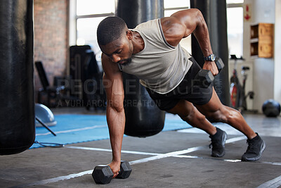 Buy stock photo Black man, fitness and muscle training with dumbbells in gym, exercise with balance and strong athlete, push up and focus. Sports, bodybuilder power and wellness with health and active lifestyle