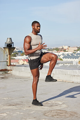 Health, fitness and black man stretching legs outdoors on city rooftop  alone. Sports, training and male athlete warm up, preparing and getting  ready for workout, running or exercise for wellness.