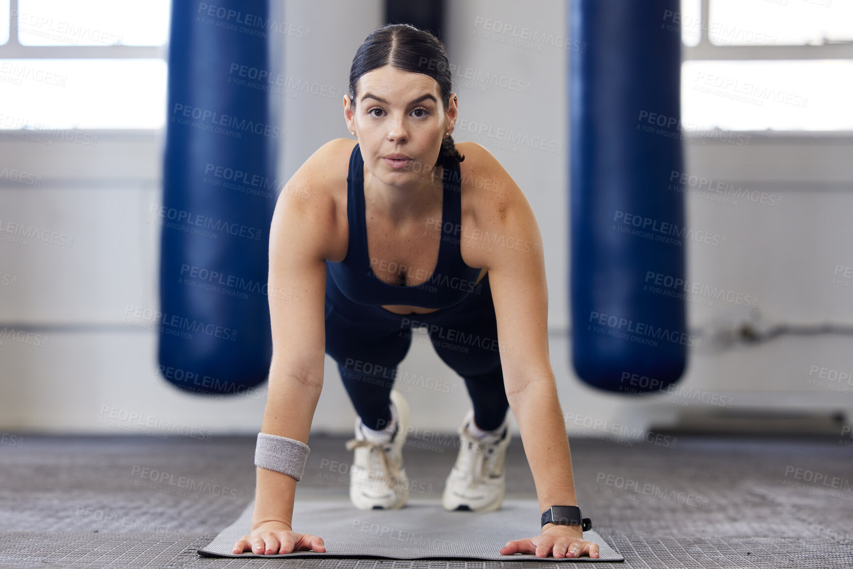 Buy stock photo Woman, plank and gym fitness for sports portrait in health, exercise training and ab wellness motivation on floor mat. Focused athlete, core workout and healthy body or muscle transformation vision