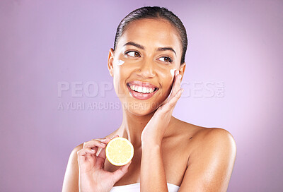 Buy stock photo Woman, face skincare or lemon cream on purple studio background for organic dermatology, healthcare wellness or self care grooming. Smile, happy or beauty model with fruit facial product or sunscreen