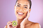 Cream, kiwi and skincare woman in studio portrait for facial beauty, healthy glow or cosmetics advertising mockup. Self love model smile for vitamin c, nutrition or green fruit in dermatology product