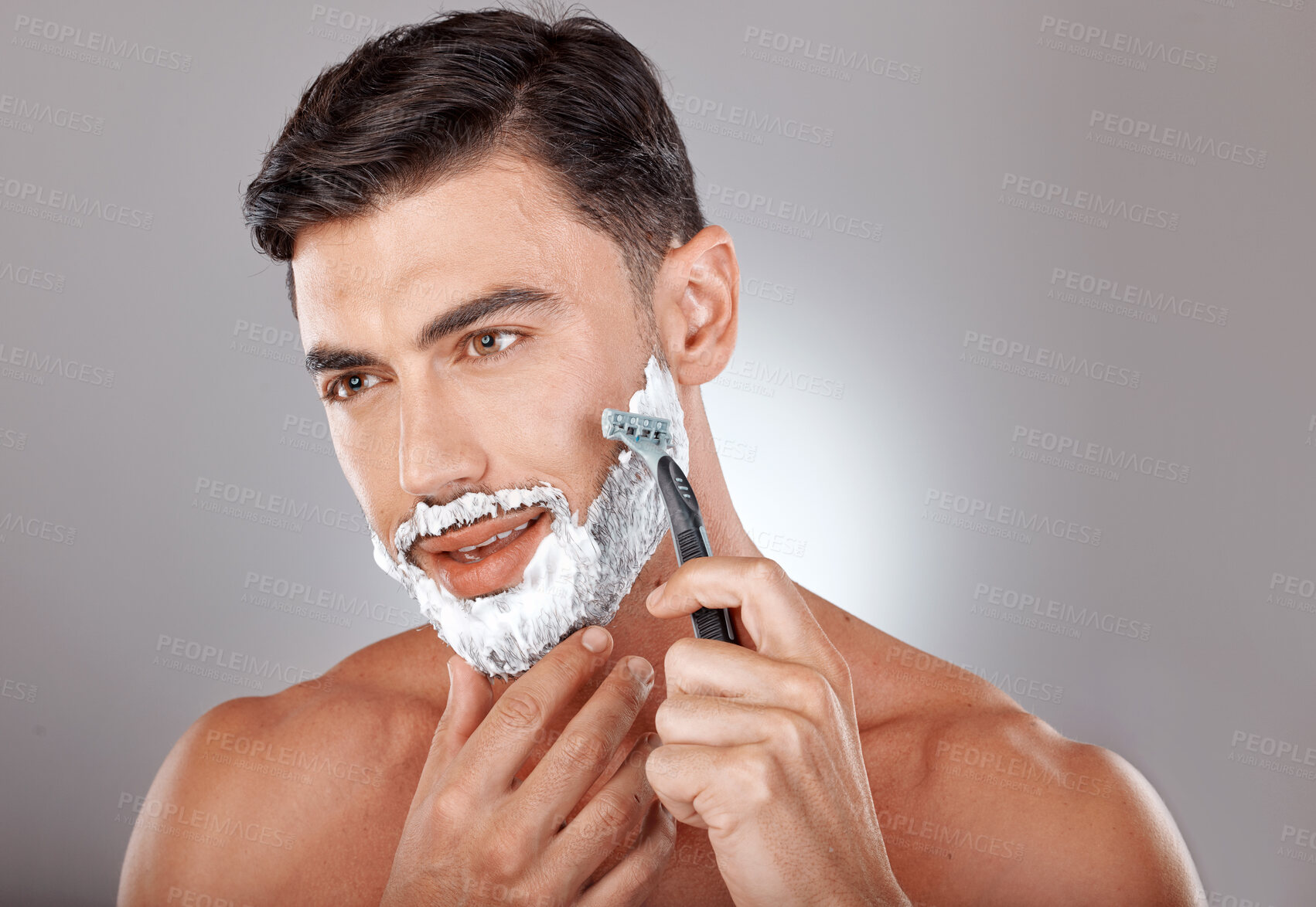 Buy stock photo Grooming, foam and shaving with face of man with razor for beauty, hygiene and skincare with morning routine. Self care, facial and shave beard with model and cream product for wellness and cleaning