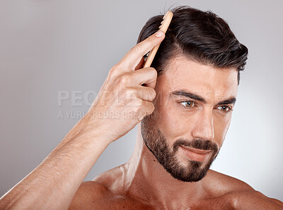 Buy stock photo Comb, beauty or man brushing hair for grooming advertising or marketing salon hair care products. Thinking, studio background or healthy male model with cool hairstyle in morning routine treatment
