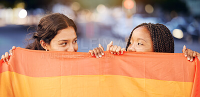 Buy stock photo Rainbow flag, LGBTQ and happy lesbian couple with love at a freedom, pride or community parade in the city. Celebration, interracial and gay women with commitment at a LGBT sexuality event in town.