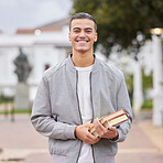 Study, books and student portrait at university, college or campus for research, knowledge and scholarship motivation. Happy young man with outdoor learning for exam, studying and reading inspiration