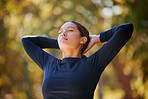 Black woman in outdoor park, breathing in natural fresh air in and morning fitness in Cape Town. Healthy spiritual wellness, zen breathe in meditation and young lady stretching arms with eyes closed