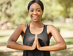 Portrait, yoga and meditation with a black woman in nature for mental health, wellness or zen fitness. Park, exercise and mindfulness with a female athlete looking for inner peace or balance outside