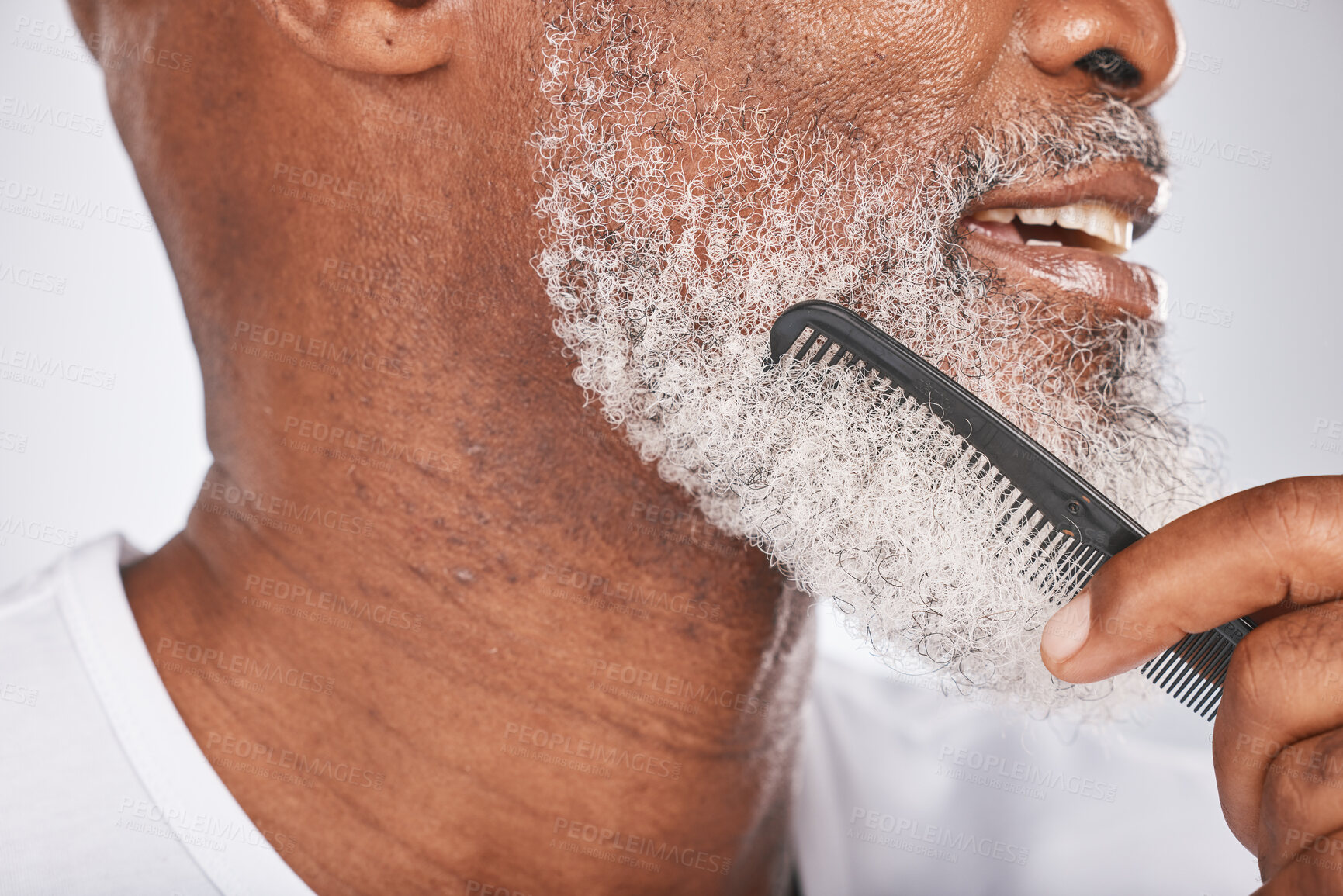 Buy stock photo Elderly, black man with comb for beard, beauty and grooming closeup with face hygiene and cosmetic care profile. Hair care, brush body hair and treatment with cosmetics against studio background