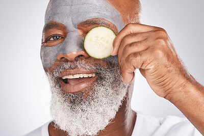 Buy stock photo Skincare, face mask or old man portrait with cucumber marketing or advertising natural vegan diet for glowing skin. Cream, happy, senior black man with beauty or healthy anti aging facial cosmetics