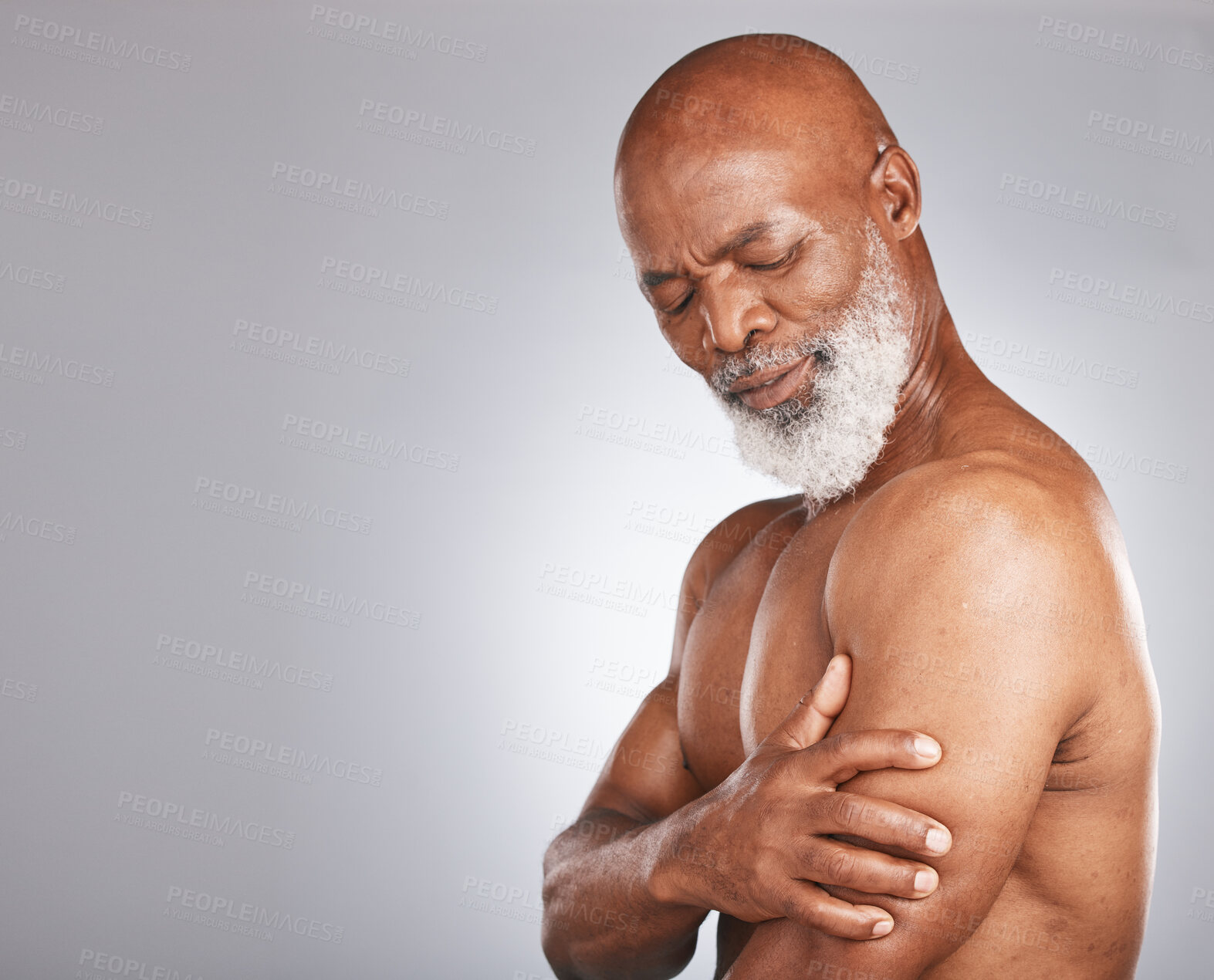 Buy stock photo Arm pain, injury and senior black man with muscle inflammation, body accident and broken bone on studio background. Healthcare, anatomy and African elderly model with painful biceps and mockup space