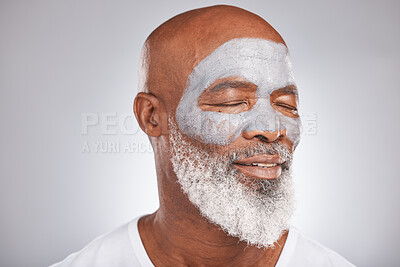 Buy stock photo Skincare, beauty or senior black man with face mask marketing or advertising a luxury beauty product for self care. Studio background, facial cosmetics or African old man relaxing with a happy smile 