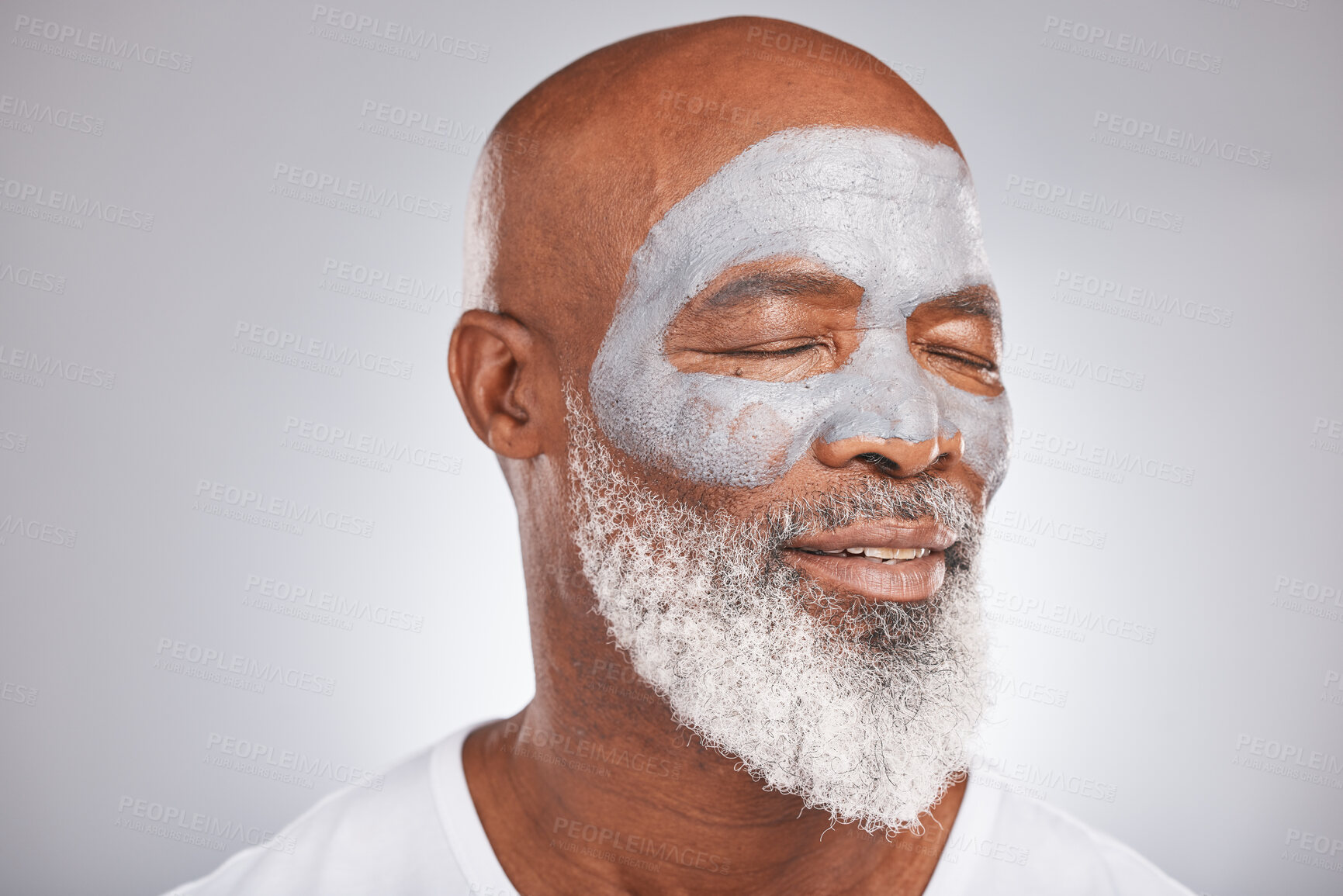 Buy stock photo Skincare, beauty or senior black man with face mask marketing or advertising a luxury beauty product for self care. Studio background, facial cosmetics or African old man relaxing with a happy smile 