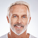 Face portrait, skincare and senior man in studio on a gray background. Wellness, cosmetics and retired, elderly and happy male model with healthy skin after spa treatment for beauty and grooming.