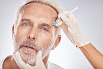 Botox, face and portrait of a senior man doing a cosmetic anti aging treatment in the studio. Plastic cosmetology, filler and elderly guy with wrinkles getting a silicone injection by gray background